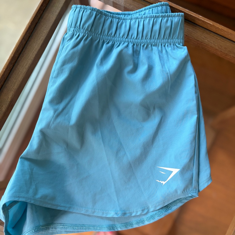 Gymshark Sky Blue Workout Shorts with White Logo